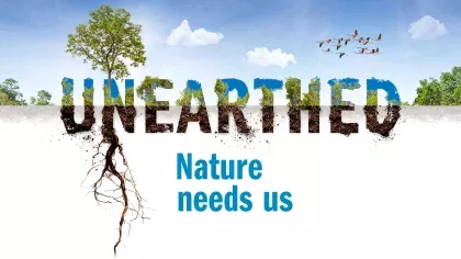 A banner showing forest, blue sky, birds and the text Unearthed Nature needs us