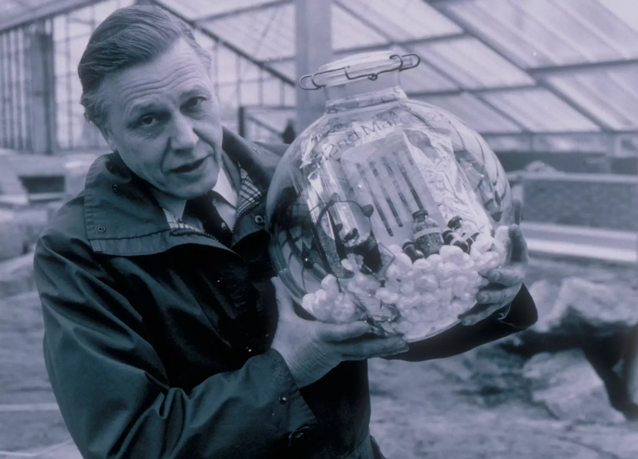 David Attenborough, Princess of Wales Conservatory David Attenborough holding a time capsule before it was buried in the foundations of the Princess of Wales Conservatory