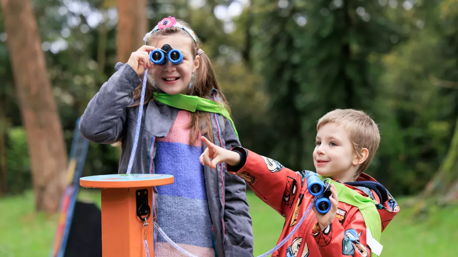 Nature Heroes, Seed Seeker Brother and sister with binoculars on Seed Seeker mission