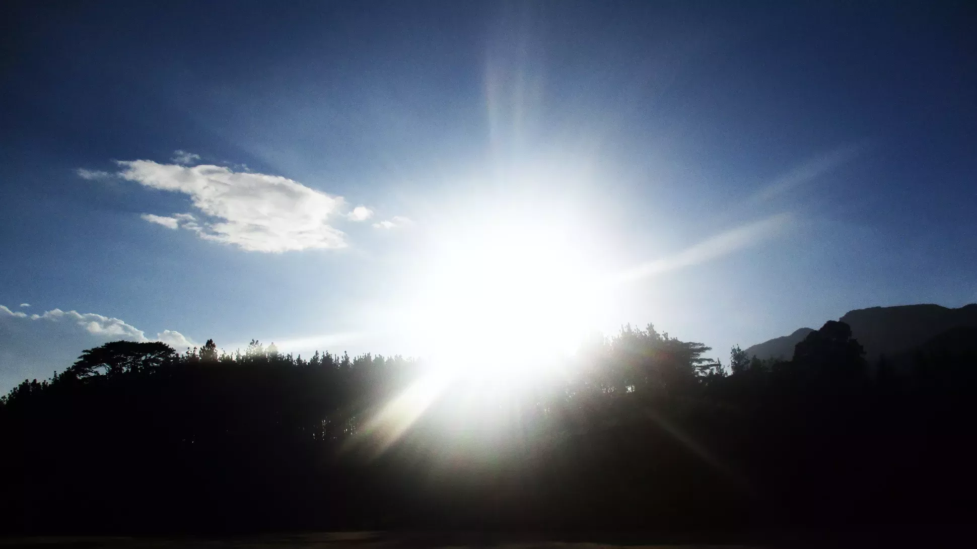 Sunlight, Charles R. Benedict on Wikimedia Commons, CC BY-SA 4.0 The sun shining over a hill
