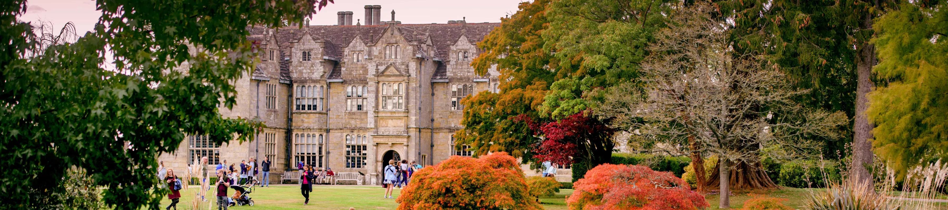 People in front of Wakehurst Mansion and Mansion Pond People in front of Wakehurst Mansion and Mansion Pond