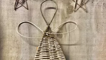 A stylized angel made of weaved willow